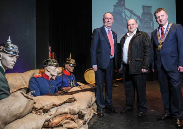 Wilbert Buchanan, chairman of Cookstown Council is pictured with Cookstown Councillor Trevor Wilson and Ian McCrea MLA on the set at the Burnavon at the Cookstown Council presentation Music and Song of the Trenches marking the 100th anniversary of World War 1.