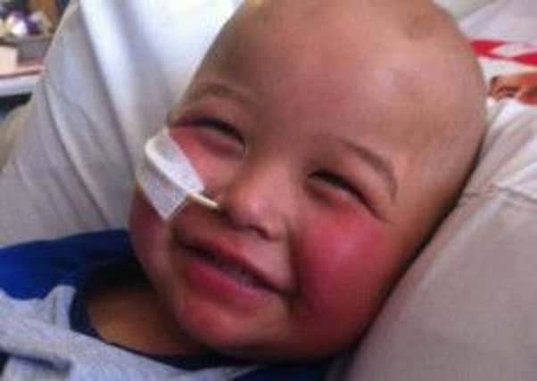 Little Caiden Tang during one of his hospital stays