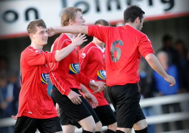 Tobermore celebrate their team's opening goal