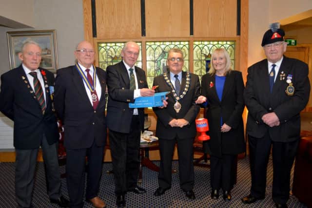 Members of the Carrickfergus Branch of the Royal British Legion with the Mayor, Alderman Charles Johnston, at the launch of the Poppy Appeal. INCT 44-109-GR