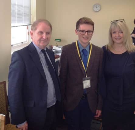 Student, Carter Herdman, with  Brenda Hale Lagan Valley MLA and Lord Morrow.