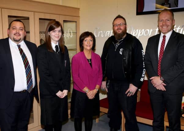 Paul Bell (second right), special guest at the Cullybackey College prize day, is pictured with (from left) Ruth Barkley (Head Girl), Tim Manson (Vice-principal), Gillian Scott (Chairman Board of Governors) and David Donaldson (Principal). INBT44-213AC