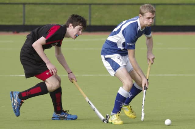 A South man keep a close eye on his Portadown counterpart during his sides 2-1 away victory on Saturday INPT44-310