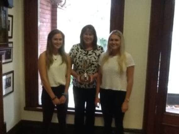 The Walker family presented the Walker Trophy to Friends'. L-R: Kirsty, mother Diane, and Jemma Walker.