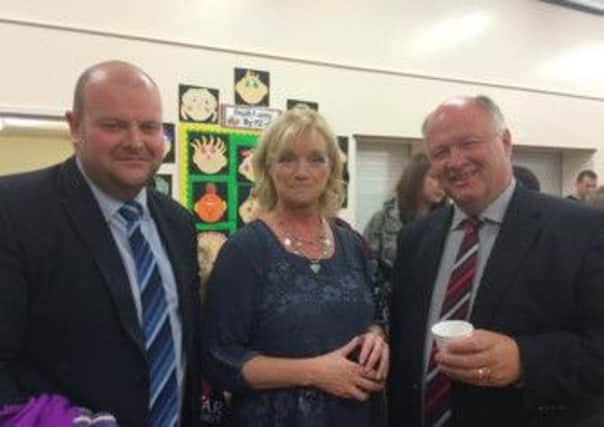 Cllr Mark Baxter with principal of Donaghcloney PS Mrs Nesbitt and local MP David Simpson.