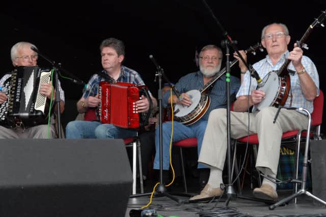 The Grousebeaters on stage at the Cairncastle Ulster Scots Festival. INLT 31-397-PR
