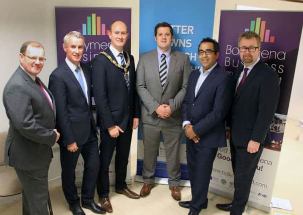 Local business men join officals and guests at the offical opening of the new Church Street Ballymena Business Centre and the launch of the BIDs project last week. INBT 44-818H