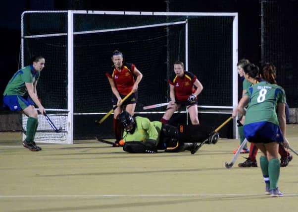 Ballyclare's Sara Coulter makes a save against Ballymena.