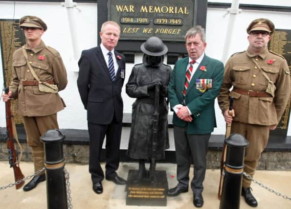 IN THE MAIN. Pictured are Sammy McClements and Noel Anderson, who were highly instrumental in the enabling of the bronze statue of a WW1 soldier which was unveiled at the War Memorial on Saturday.INBM45-14 034SC
