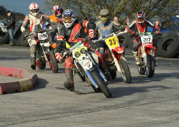 Jason Meara leads the group in the second Clubmans race. Picture: Roy Adams.