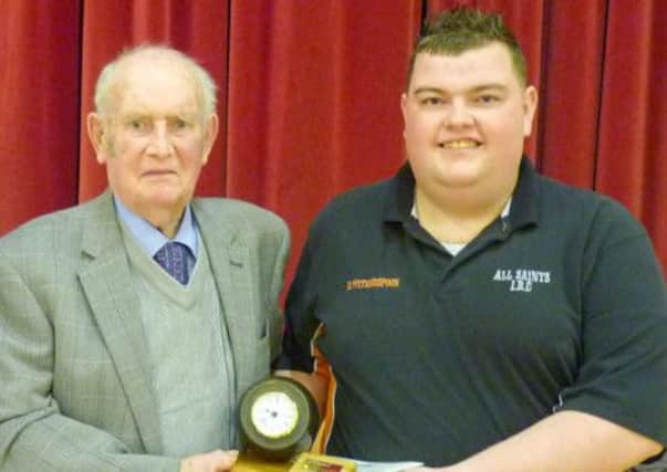 ohn McMurtry presenting Darren Witherspoon with the Snoddy Singles trophy back in March