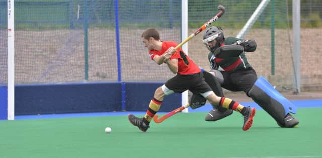 Neil Gilmore has made a habit of scoring for Banbridge and (below) Jamie Wright won Player of the Tournament in the Anderson Cup to get his Banbridge career off to a flyer.