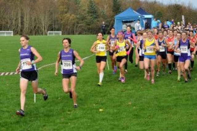 Springwell's Eimear Mullan and Sonia Knox lead the ladies into the first corner of the ladies race. (S)