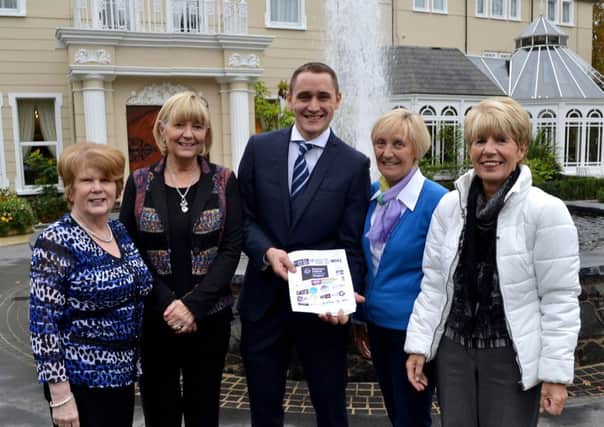Gus McConville of the Tullyglass House Hotel is pictured with Murial Barr, Rosemary Moore, Toni Bailie and Maureen Baw discussing the plans for the annual Ballymena Hospice Christmas Fair on November 12. INBT45-208AC