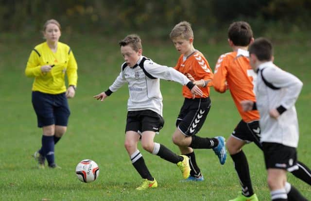 Youth soccer action from the under-13 shield match between Lisburn Distillery and Lisburn Youth, at Glenmore Activity Centre. US1445-504cd  Picture: Cliff Donaldson