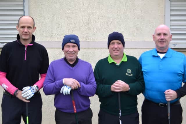 Gavin Hawkins, Stephen Stewart, Martin McDonald and Michael Rooney about to tee off at Lisburn Golf Club.
