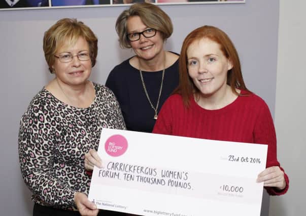 Pictured are Anne Magill and Kelley McKeown from Carrickfergus Womens Forum with Joanne McDowell, Big Lottery Fund NI director.  INCT 46-726-CON