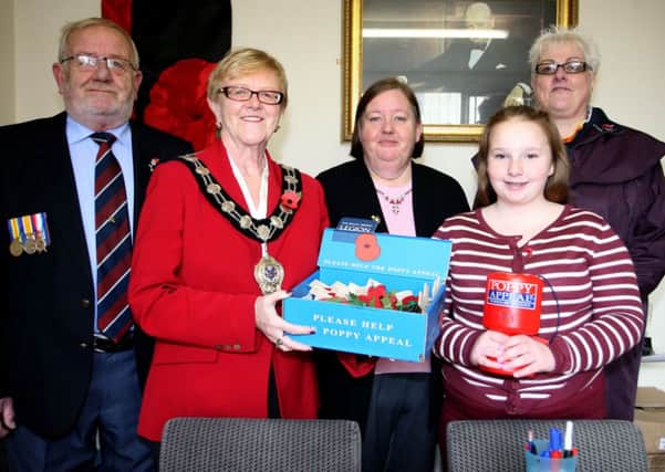 Mayor of Ballymena, Cllr. Audrey Wales, is pictured along with Sam Beattie (Vice-chairman RBL), Linda Davidson (Poppy Appeal Organiser), Karen Taylor (Branch Secretary) and Megan Davidson (collector) at the launch of the Poppy appeal in Ballymena. INBT45-247AC