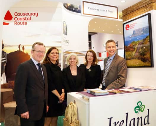 Niall Gibbons, Tourism Ireland CEO; Vanessa Markey, Tourism Ireland; Gillian Little, National Trust; Alex Mehaffy, Giants Causeway Centre; Jason Powell, Causeway Coast & Glens Tourism, at World Travel Market 2014.
 INBM46-14