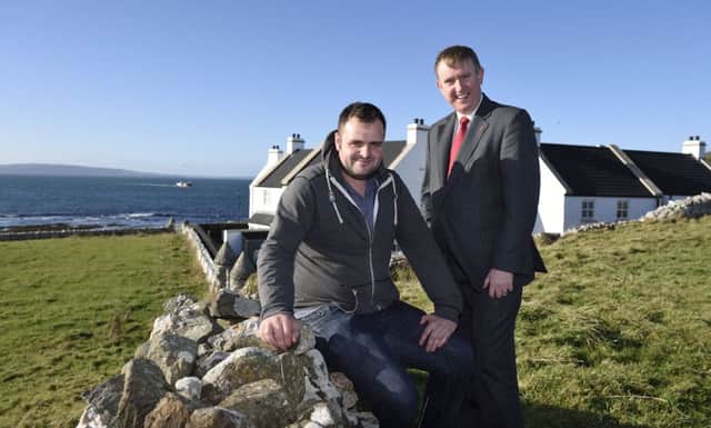 Rathlin residents voice 100% satisfaction in new homes: Storey

Social Development Minister, Mervyn Storey MLA, visits Gort Beag, a social housing scheme on Rathlin Island where residents have voiced 100% satisfaction in their new homes. The Minister is pictured with Gort Beag tenant, Ciaran McCurdy. Picture: Michael Cooper. inbm46-14s