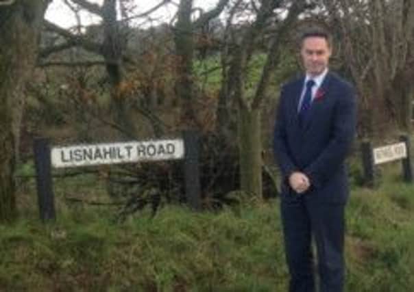 Paul Frew MLA at Lisnahilt crossroads where he would like to see safetly measures introduced.