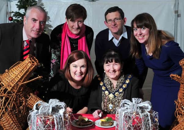 Magherafelt District Council Chairperson Kate McEldowney with Sharon Arbuthnot (Arts & Events Officer), Michael Browne (Head of Development Services) Ann-Marie Campbell (Director of Policy & Development), Cllr Martin Kearney and Davina McCartney (Towns & Community Regeneration Officer at Magherafelt District Council) during the launch of the council's Christmas Market.INMM4514-441