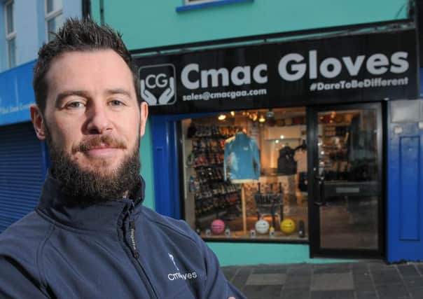 Ryan O'Neill, pictured outside the new premises of Cmac Gloves in Irish Street, Dungannon.