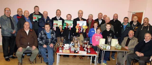 WINNERS ALL. Pictured are prizewinners, who were pictured at the Ballymoney Ornithological Association's annual Bird Show at St James's Church Hall on Saturday.INBM46-14 092SC.