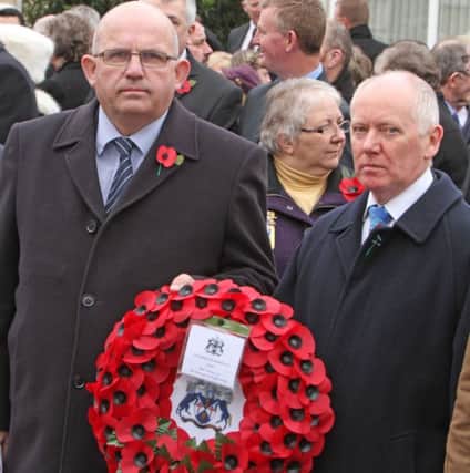IN MEMORY. Cllr John Finlay and Chief Executive John Dempsey lay a wreath on behalf of the Council on Sunday.INBM46-14 053SC.