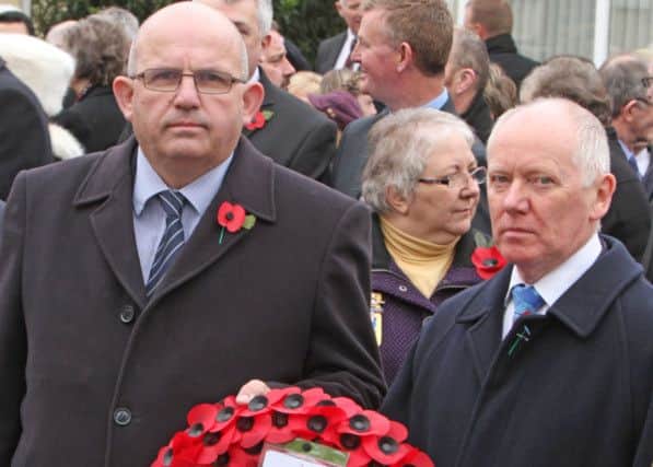 IN MEMORY. Cllr John Finlay and Chief Executive John Dempsey lay a wreath on behalf of the Council on Sunday.INBM46-14 053SC.