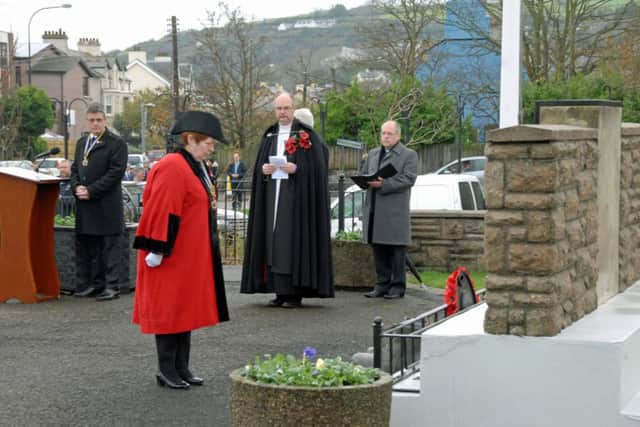 Councillor Isobel Day, president of the Whitehead branch of The Royal British Legion, at the war memorial. INCT 46-177-GR