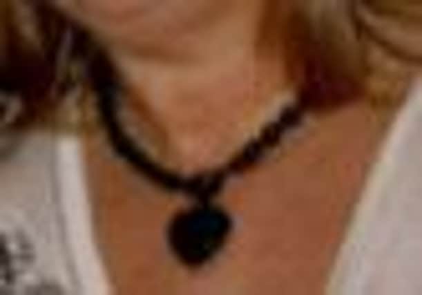 Detectives have issued an image of a necklace believed to have been taken during the burglary of a house in the Old Ballymoney Road, Ballymena on October 22.