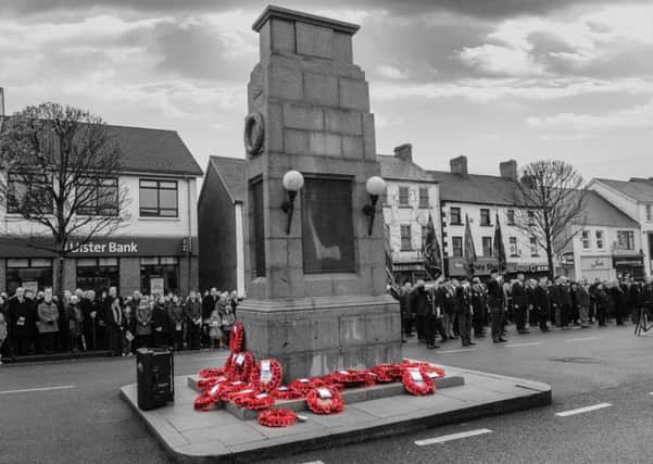 A sea of red poppy wreaths laid at the foot of Cookstown Cenotaph at the Remembrance Day Service last Sunday.