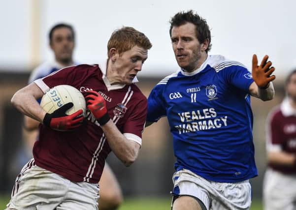 Slaughtneil's Christopher Bradley and Cavan Gaels Michael Lyng in action at Sunday's Q-Final.
©Russell Pritchard / Presseye