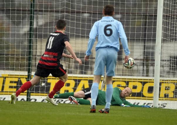 Ballymena United were in dificulty in Saturday's game against Coleraine from the moment Dwayne Nelson was unable to keep out Neil McCafferty's fifth minute free kick. Picture: Press Eye.