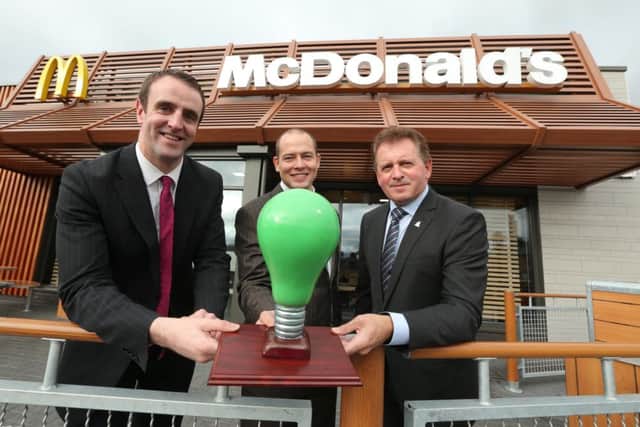 Environment Minister Mark H Durkan; Chris Allan from Keep Northern Ireland Beautiful and John McCollum, McDonalds Sprucefield franchisee.