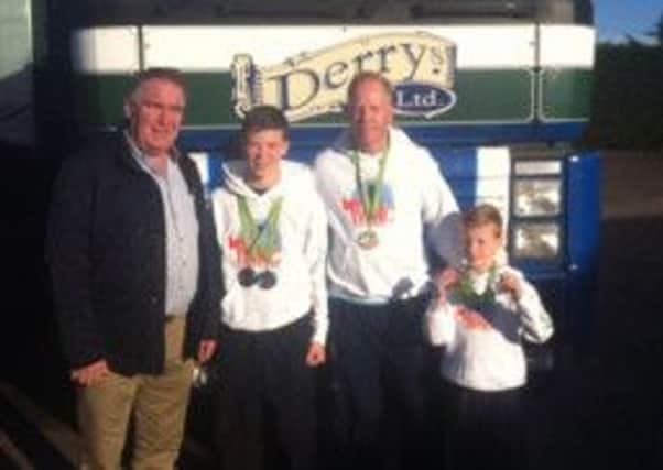 Dad Stuart and sons Brandon and Dylan Adamson who are all medal winners at the recent the recent world Kick Boxing Championships in Portugal.  INLM4714-420