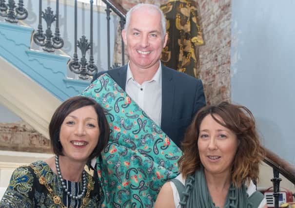 The Mayor Councillor Brenda Stevenson and Marc Gerty pictured with Deirdre Wilde from the Design Hub in Shipquay Street. Picture Martin McKeown. Inpresspics.com.