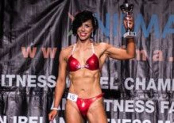 Kelly Lamont, who lifted two trophies at the NIFMA  Fitness Modelling World Championships. INLT-47-701-con