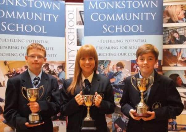 Cousins Aaron and Jason McCone celebrated sporting achievements, with Aaron being named Sportsman of the Year and Jason winning the Junior Boys Athletics Shield. They are accompanied by Sportswoman of the Year, Katie Sloan. INNT 47-514CON