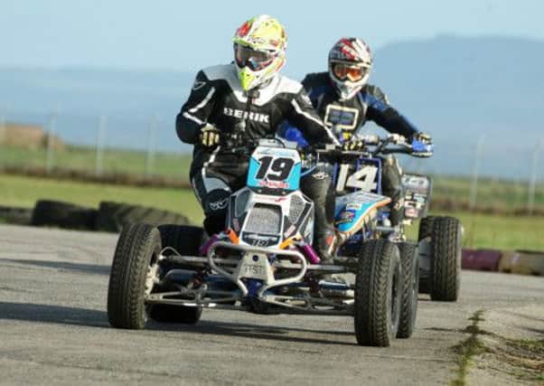 Top two men in the quad class. Mark Donnelly leads Justin Reid. Picture: Roy Adams.