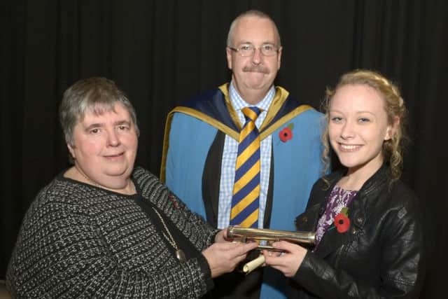 Margaet Mayne, Chairperson of Banbridge High School Board of Governors presented the Mayne Anniversary Scroll for Creativity in GCSE Music Composition to Lucy Smith, included is Principal Andrew Bell © Edward Byrne Photography INBL1445-223EB