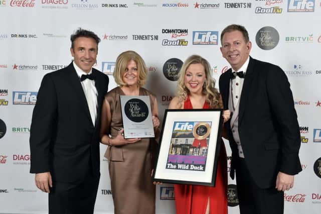 Kieran Bradley, Eileen Selfridge, Sara Girvin, Sunday Life and Kieran Donnelly pictured at Pubs of Ulsters prestigious Pub of the Year Awards 2014, where The Wild Duck Inn, Portglenone won the Best Entertainment Award. In addition to its big win, The Wild Duck was a finalist in the Best Marketing Idea category and was shortlisted for the Best Big Idea award. The Awards night, hosted by Cool FM Breakfast Show Host, Pete Snodden, was attended by the best in the hospitality business and was held at the La Mon Hotel and Country Club on Wednesday 12th November 2014. The annual Pub of the Year Awards are the only industry recognised awards and provide a valuable opportunity to recognise the significant contribution local pubs make, not only within their own communities, but to the industry as a whole. This years awards were sponsored by Britvic, Coca-Cola, Diageo, Dillon Bass, Heineken Northern Ireland, Molson Coors, Richmond Marketing, Tennents NI, Drinks Inc. and media partners, Sunday Life, Downtown/Cool FM a