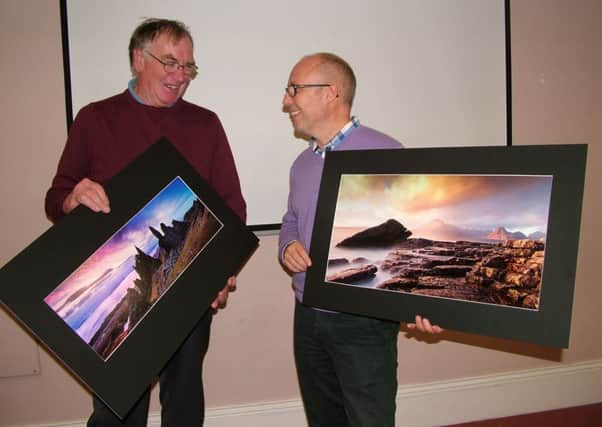 John Miskelly (right) and Raymond Hughes, MNPC Chairman, discussing landscape photography. INNT 42-516CON