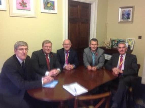 Lagan Valley MLAs Jonathan Craig  and Edwin Poots with Stormont Education Minister John ODowd, Dromore High School's William Paterson and Principal John Wilkinson.