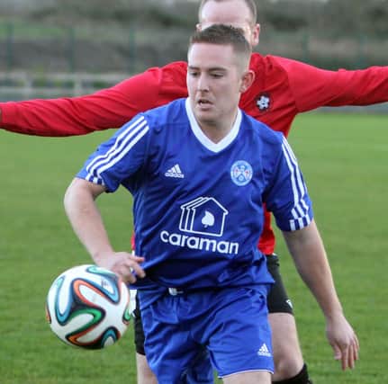 EYE BALL. United 'Fran' McKeena gets in front of his Sport & Leisure opponent on Saturday.INBM47-14 095SC.