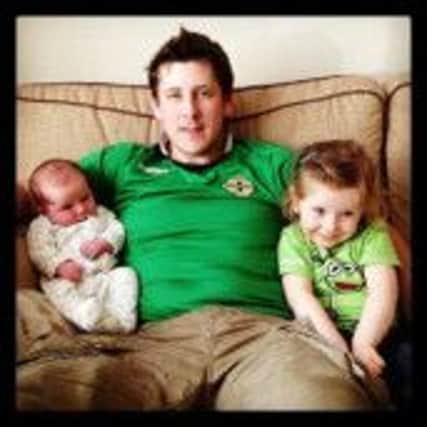 Christopher Hendrie with his children