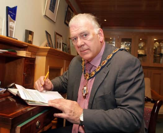 Ballymoney Mayor, Ald Bill Kennedy sets up an appeal account for the Gilmour family. inbm47-14
