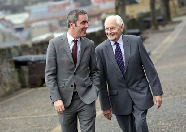 Ulster University chancellor and acclaimed actor James Nesbitt, with his father James, on Derry's historic Walls.