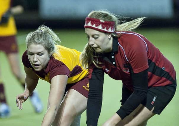 Mossley's Tori Wallace (left) scored twice against Limavady.